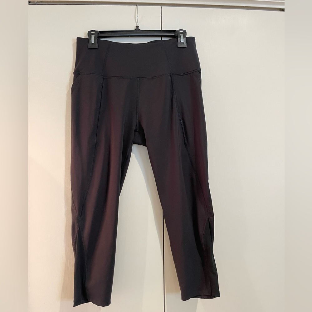 Layer 8 black workout leggings, mesh detail and side pockets.